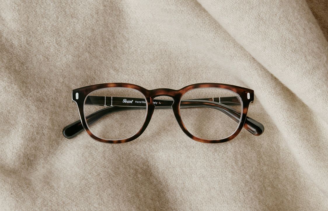 Persol optical frame on linen